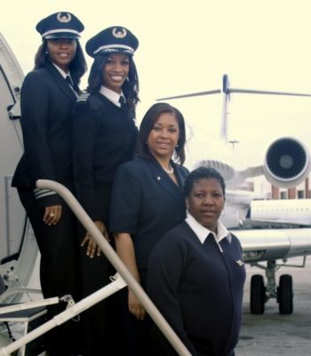 Captain Rachelle Jones, First Captain Stephanie Grant, Flight Attendants Diana Galloway and Robin Rogers-Atlantic Southeast Airlines