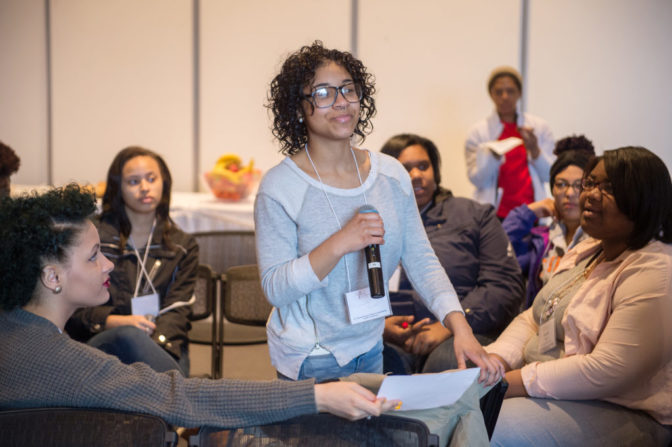 Sisters Empowering Sisters 2015 C.H.O.I.C.E.S. Experience — A group of young women stands together talking, laughing and some appear to be dancing