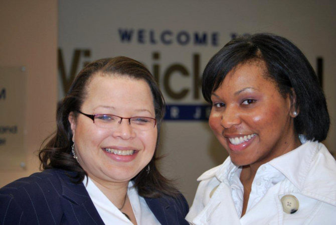 whatwedo-build B.U.I.L.D. Mentoring Collective — Two women look at the camera, smiling